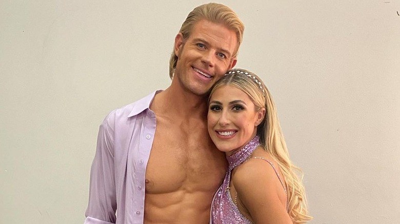 Trevor Donovan and Emma Slater posing