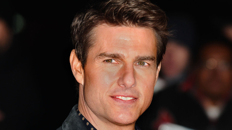 Tom Cruise looking away