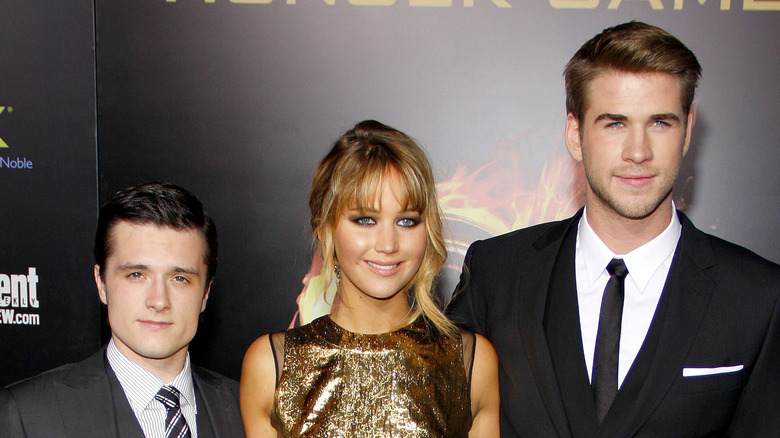 Liam Hemsworth, Jennifer Lawrence and Josh Hutcherson on the red carpet