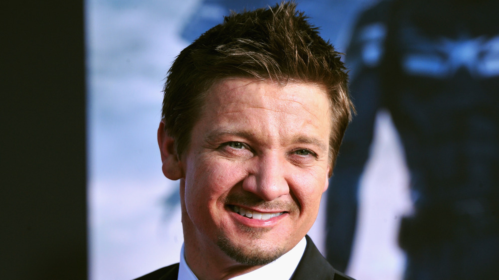 Jeremy Renner smiling on the red carpet