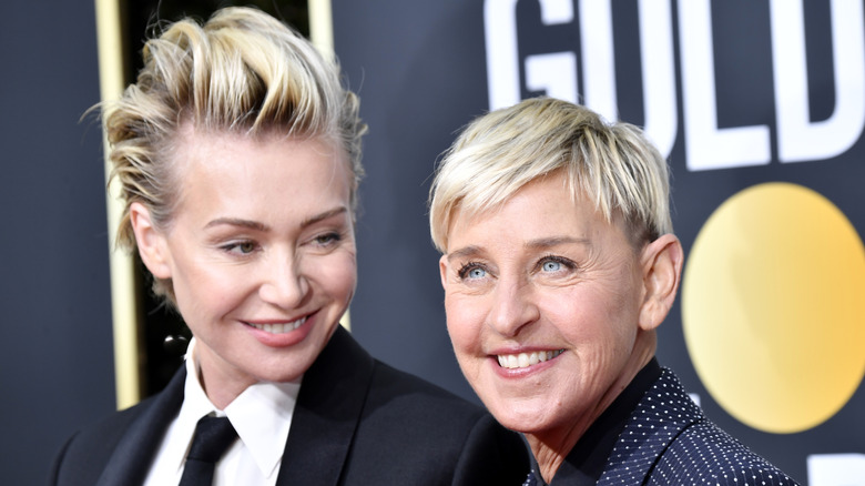 Portia de Rossi smiling gazing at Ellen DeGeneres