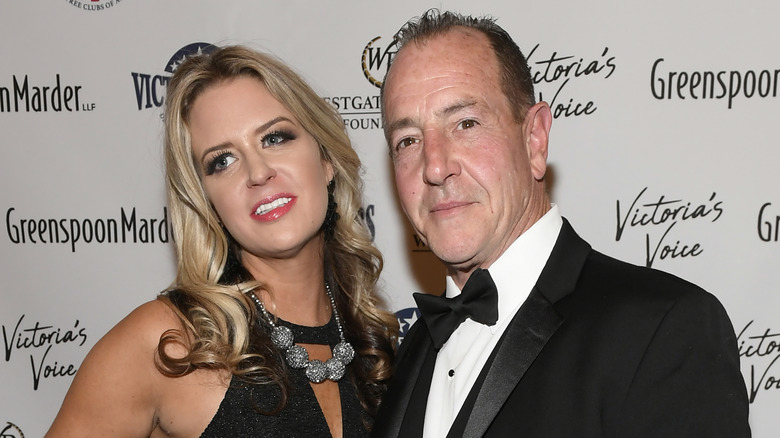 Kate Major and Michael Lohan posing and smiling together