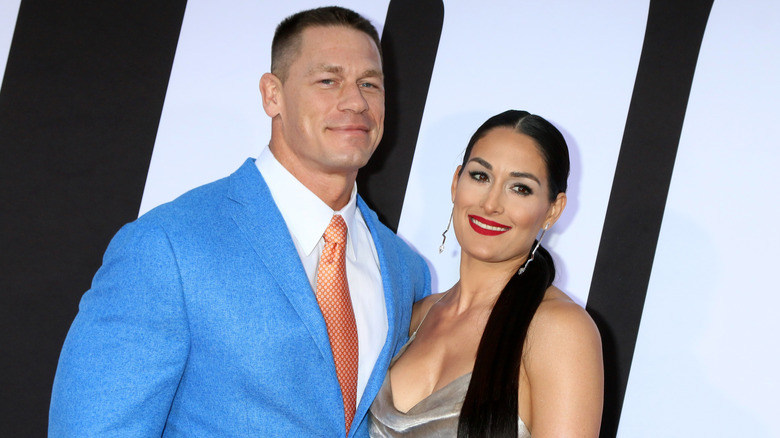 John Cena and Nikki Bella pose together in 2018