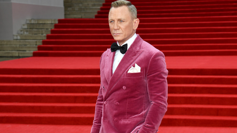 Daniel Craig wearing a pink blazer