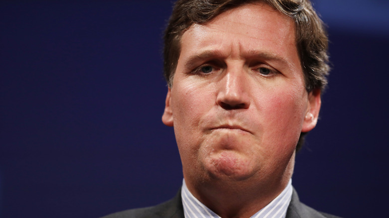 Tucker Carlson making a face