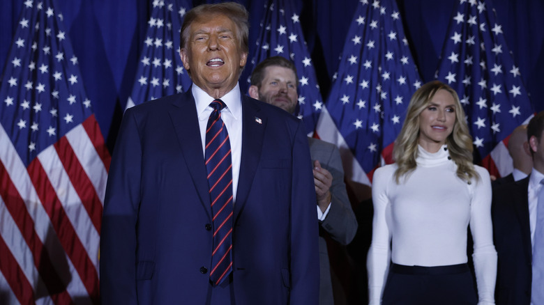 Lara Trump behind Donald Trump