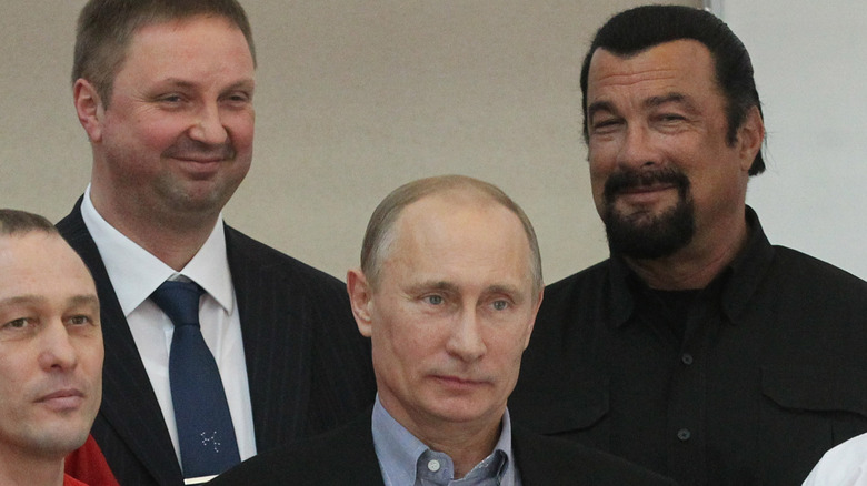 Vladimir Putin and Steven Seagal standing together