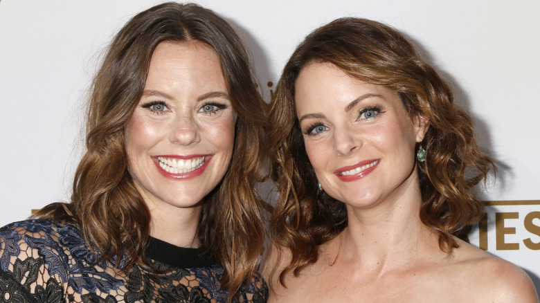 Ashley Williams and sister Kimberly Williams-Paisley posing at the Hallmark Channel and Hallmark Movies and Mysteries 2017 Summer TCA Tour