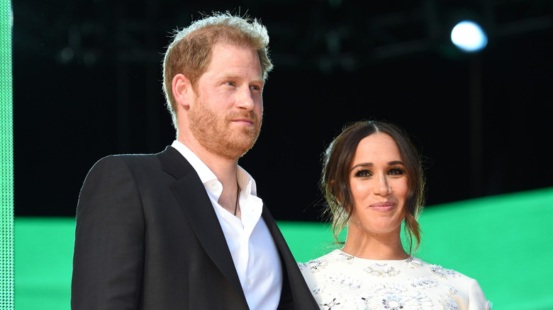 Prince Harry posing with Meghan Markle