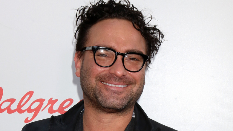 Johnny Galecki smiling in glasses