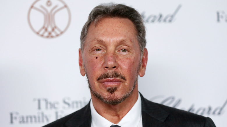 Larry Ellison wearing a suit and tie