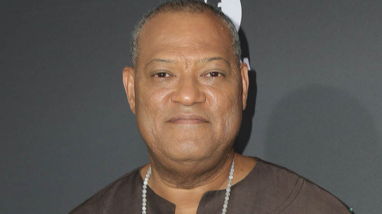 Laurence Fishburne wearing brown