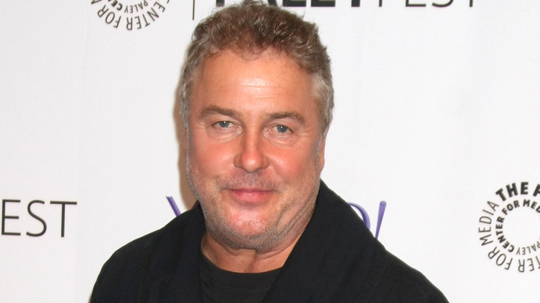 William Petersen in a coat