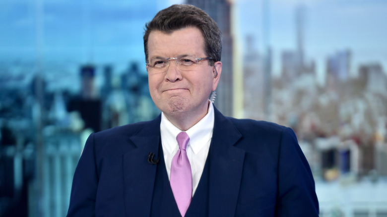 Neil Cavuto smiling on set.