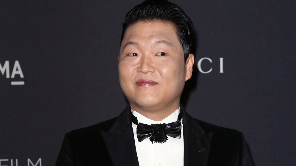 Psy smiling at camera