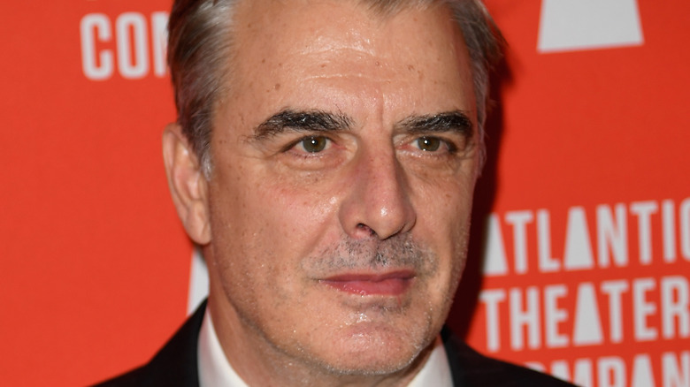 Chris Noth looks on 