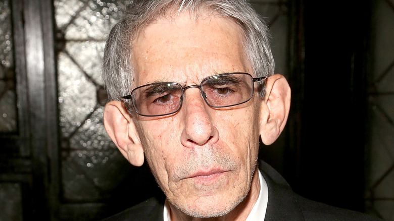 Richard Belzer in tinted glasses