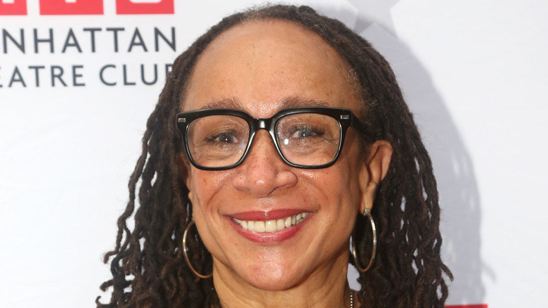 S. Epatha Merkerson smiling wearing gold hoops