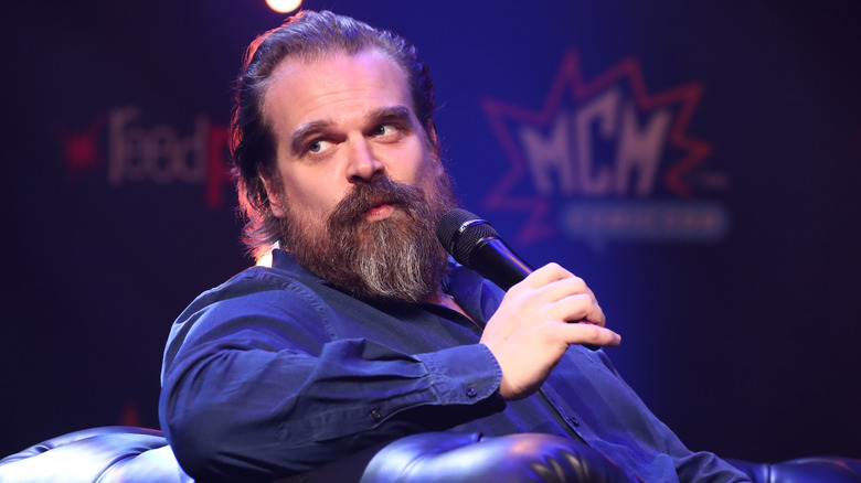 David Harbour speaking into microphone