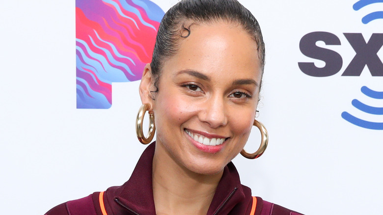 Alicia Keys smiling on red carpet