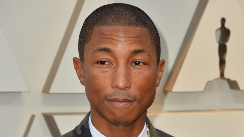 Pharrell Williams poses on Oscars red carpet