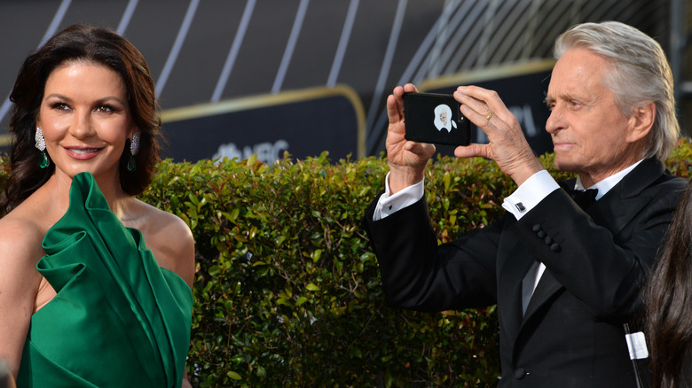 Michael Douglas snaps a photo of Catherine Zeta-Jones 