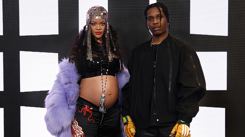 Rihanna showing baby bump beside A$AP Rocky