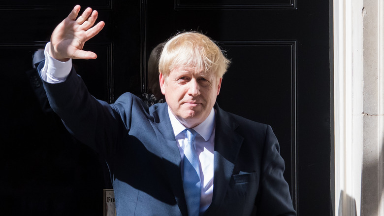 Boris Johnson waving outside 10 Downing Street 
