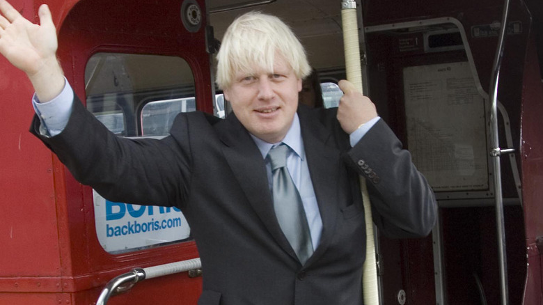 Boris Johnson riding a bus 