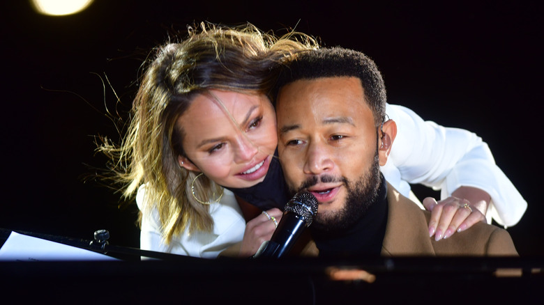 Chrissy Teigen and John Legend on stage