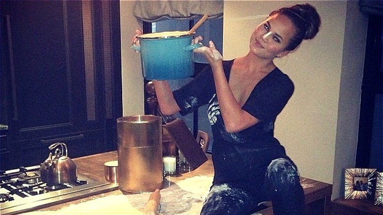 Chrissy Teigen baking