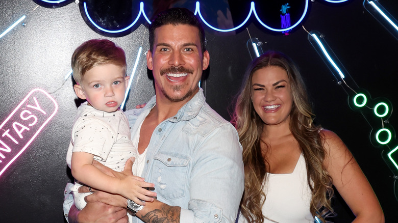 Jax Taylor, Brittany Cartwright, and their son Cruz pose together