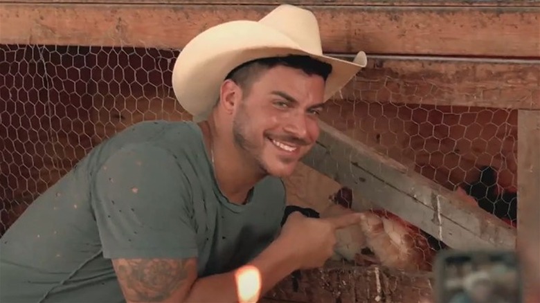 Jax Taylor poses at Brittany Cartwright's farm