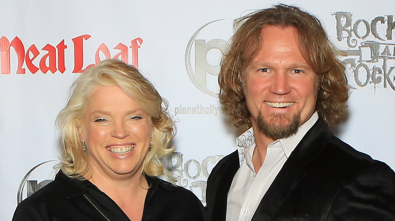 Janelle Brown and Kody Brown smiling on red carpet