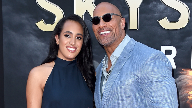 Simone and Dwayne Johnson posing