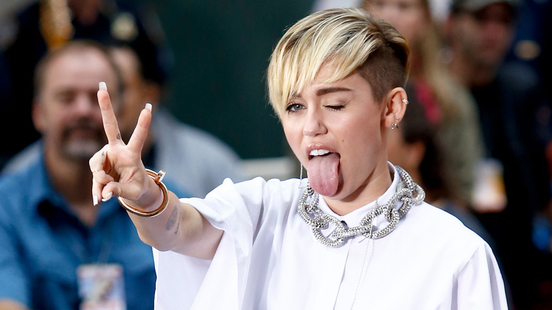 Miley Cyrus sticking tongue out