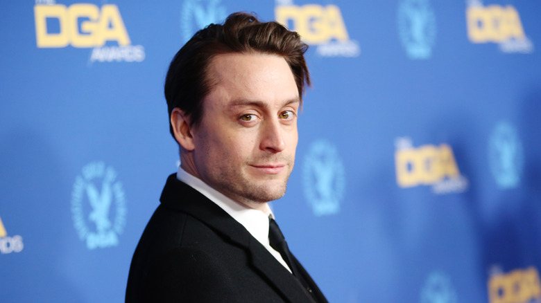 Kieran Culkin looking over his shoulder