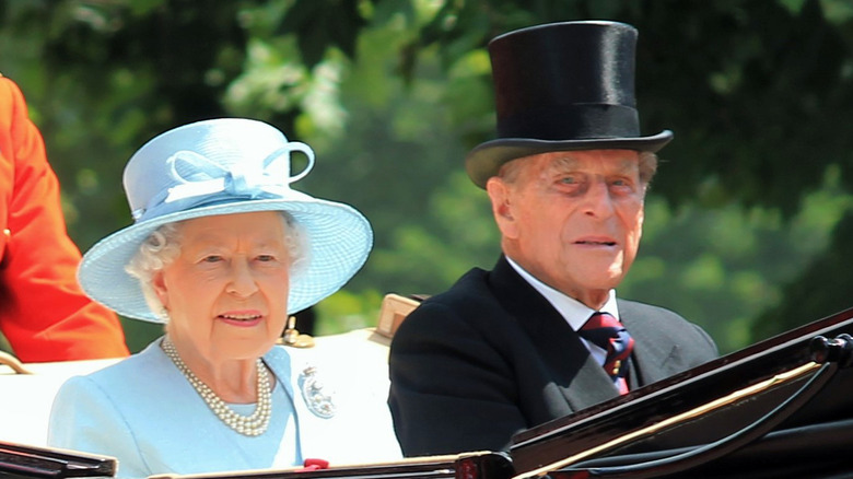 Queen Elizabeth and Prince Philip at an event 