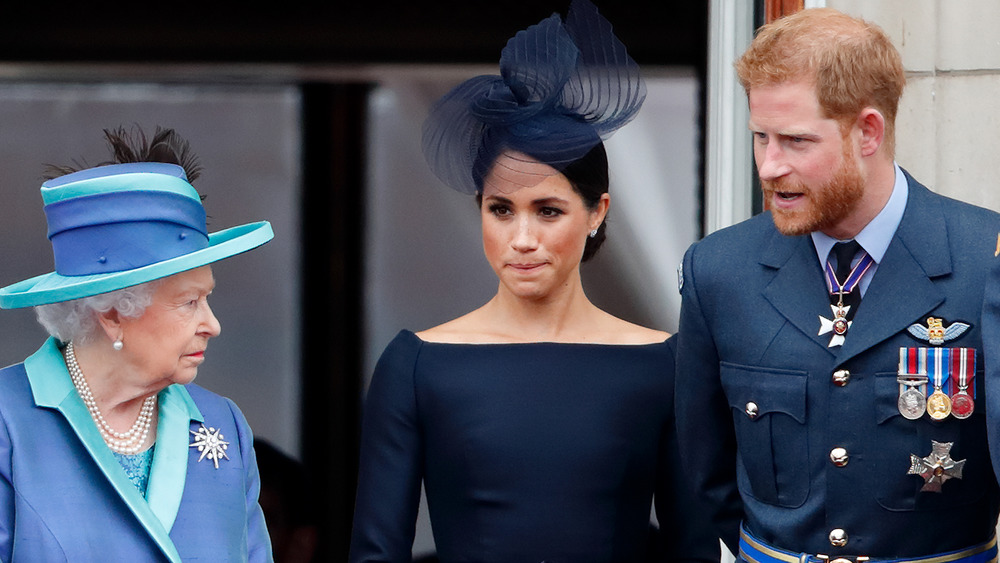 Queen Elizabeth, Meghan Markle, and Prince Charles