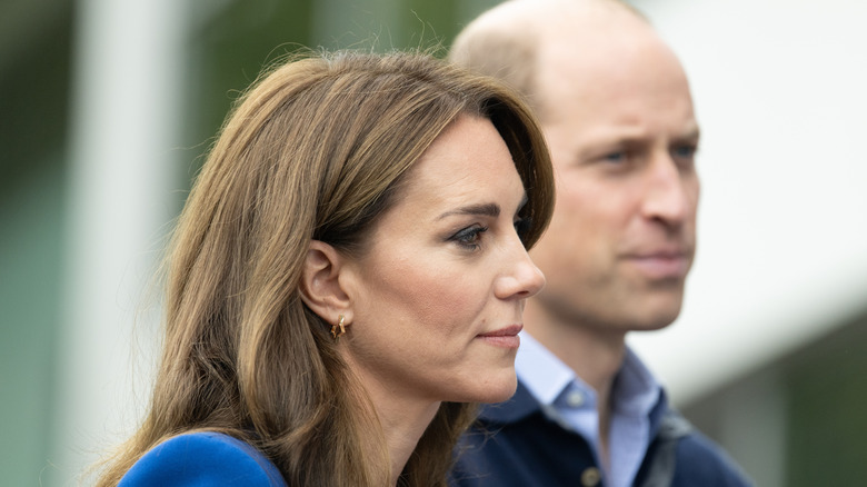 Princess Catherine with Prince William in the background