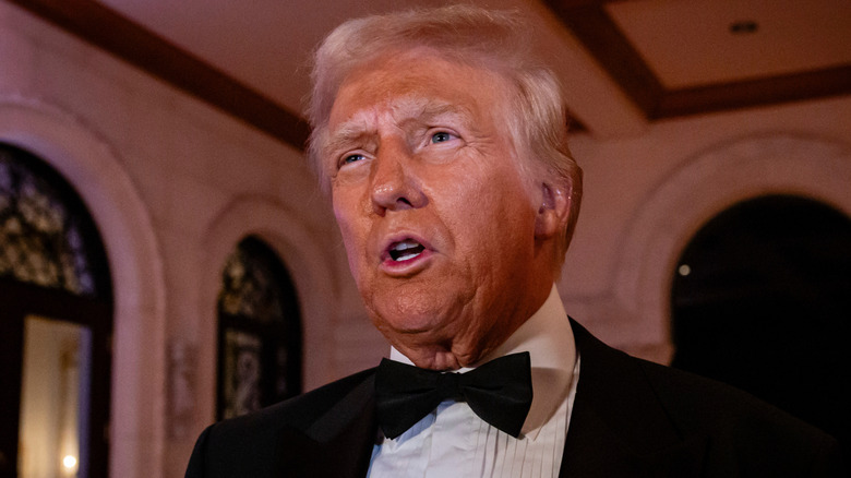 Donald Trump wearing a bowtie with his mouth open