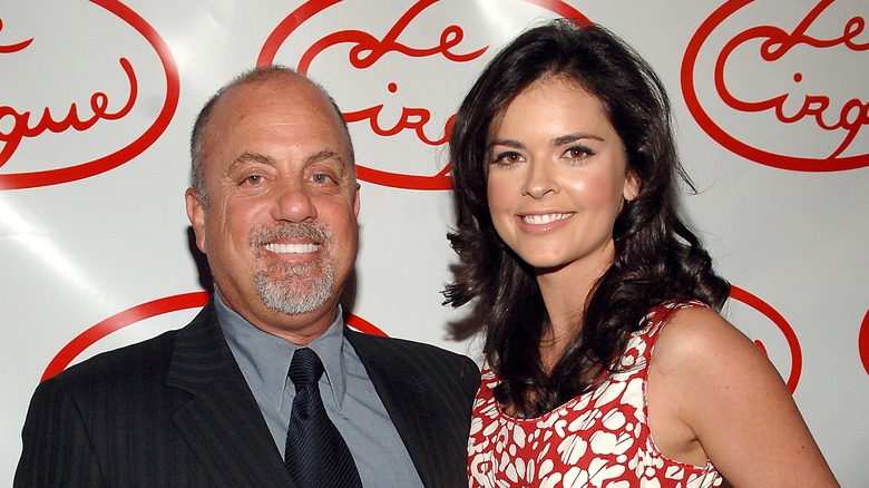 Billy Joel and Katie Lee Biegel posing