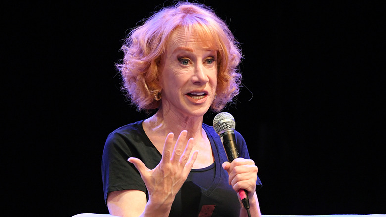 Kathy Griffin holding mic