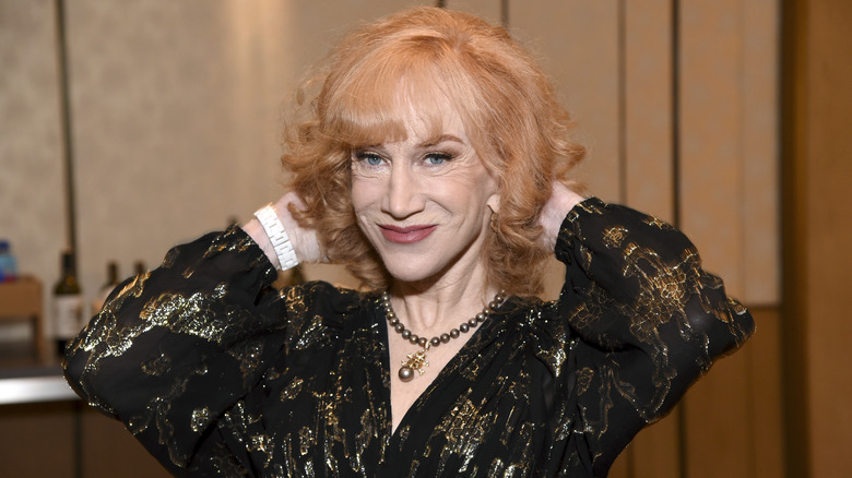 Kathy Griffin fluffing her hair