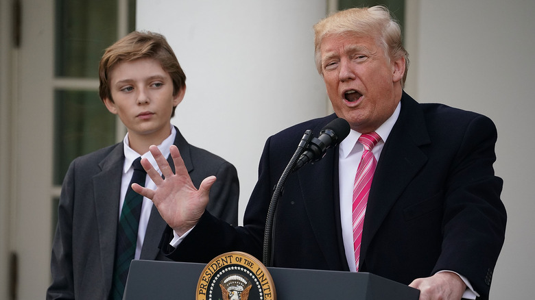 Barron Trump watching Donald Trump speak