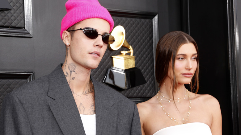 Justin and Hailey Bieber posing