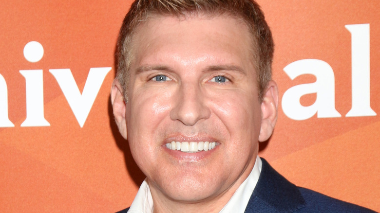 Todd Chrisley smiles