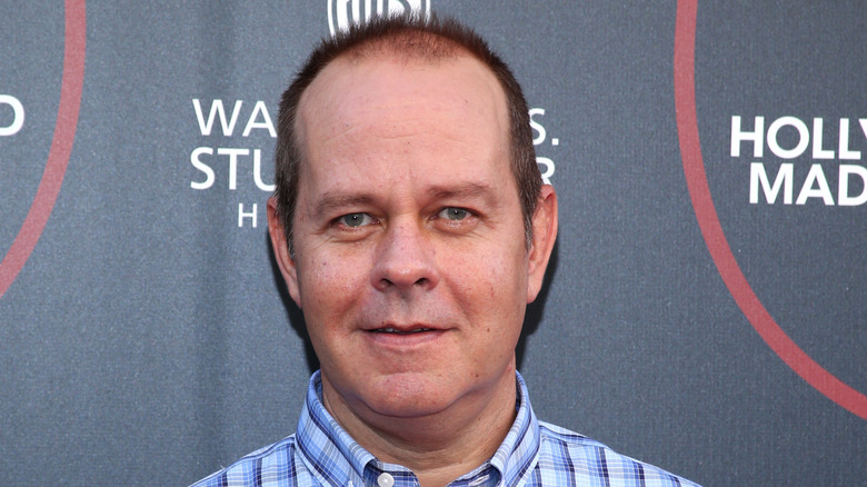 James Michael Tyler smirking