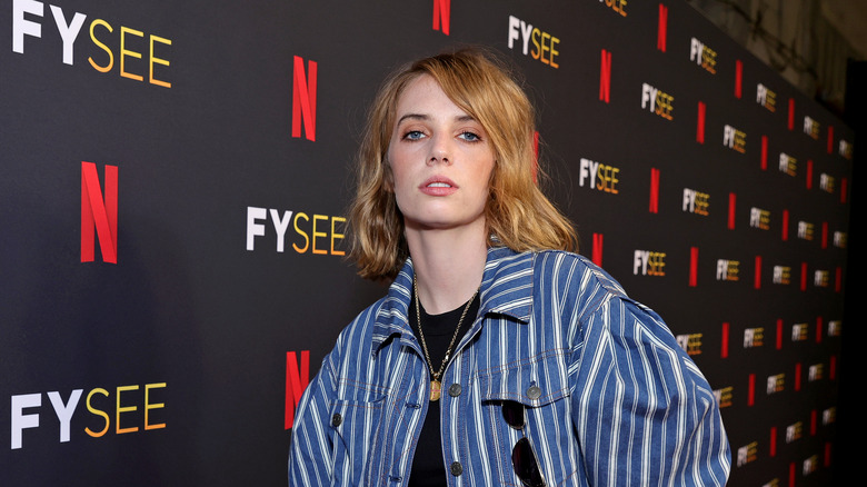 Maya Hawke pink lip blonde bob hair