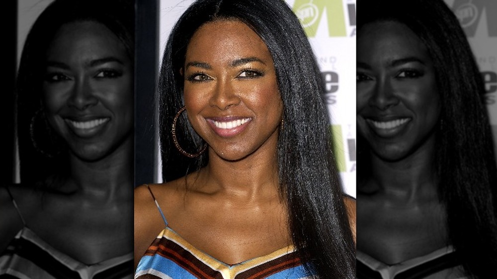 Kenya Moore smiling